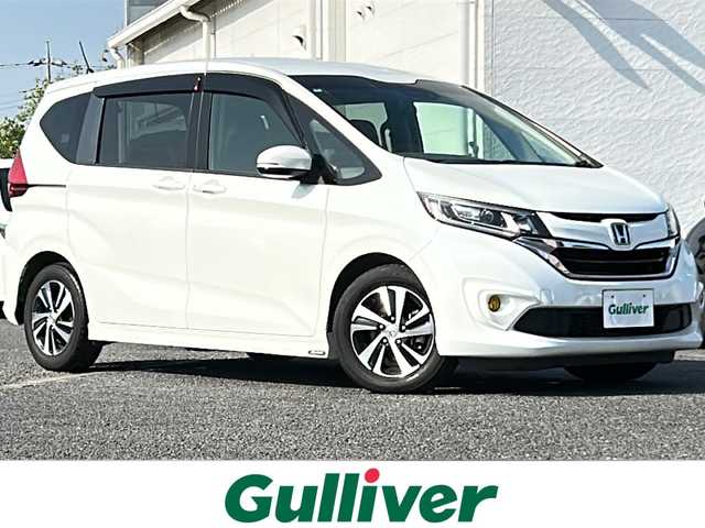 ホンダ フリード＋ G ホンダセンシング 千葉県 2017(平29)年 8万km ホワイトオーキッドパール ナビ　バックカメラ　レーンアシスト　ホンダセンシング　レーダークルーズ　ＥＴＣ　両側パワースライドドア　ドラレコ　ＢＴ　１５インチＡＷ　ＬＥＤライト　オートライト　モデューロエアロ　フォグライト