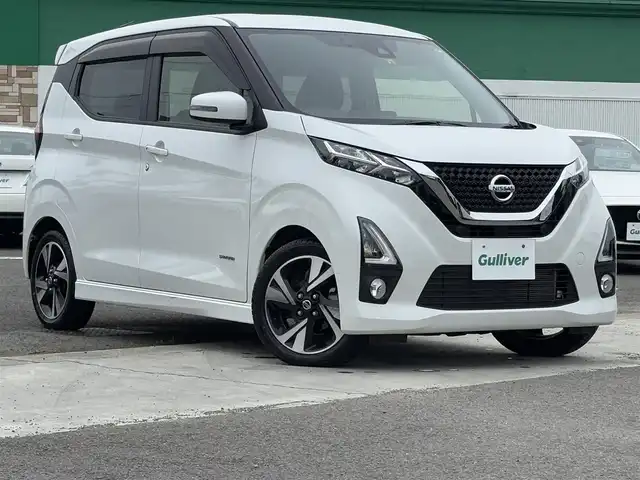 日産 デイズ ハイウェイスターG ターボ 徳島県 2020(令2)年 2.9万km ホワイトパール 純正７型SDナビゲーション（MJ119D-W）/AM/FM/Bluetooth/TV/USB/SD/iPod/WALKMAN/CD/バックカメラ/ナビ連動ドライブレコーダー/ETC/純正15インチアルミホイール/アイドリングストップ/ウィンカーミラー/純正フロアマット/コーナーセンサー/プッシュスタート/スマートキー/スペアキー/本革巻きステアリング/ドアバイザー/プッシュスタート/純正LEDヘッドライト/フォグライト/ヘッドライトレベリング/オートマッチックビーム/カーテンエアバック/取扱説明書
