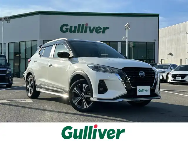 日産 キックス X ツートーンインテリアED 愛媛県 2021(令3)年 5万km ブリリアントホワイトパール/ピュアブラック 2トーン 登録時走行距離：49564Km/純正メーカーOPメモリナビ/ビルトインETC/追従クルコン/EVモード/横滑り防止装置/盗難防止装置/衝突軽減システム/前後コーナーセンサー/前後ドラレコ/LEDヘッドライト/オートライト/オートハイビーム/フォグランプ/エンジンスタートボタン/ツートン革シート/シートヒーター/ハンドルヒーター/スマートキー/スペアキー一本/純正アルミホイール/エアロ