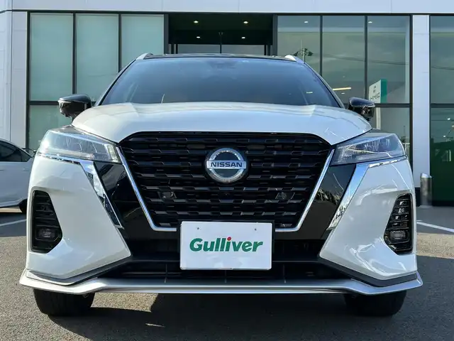 日産 キックス X ツートーンインテリアED 愛媛県 2021(令3)年 5万km ブリリアントホワイトパール/ピュアブラック 2トーン 登録時走行距離：49564Km/純正メーカーOPメモリナビ/ビルトインETC/追従クルコン/EVモード/横滑り防止装置/盗難防止装置/衝突軽減システム/前後コーナーセンサー/前後ドラレコ/LEDヘッドライト/オートライト/オートハイビーム/フォグランプ/エンジンスタートボタン/ツートン革シート/シートヒーター/ハンドルヒーター/スマートキー/スペアキー一本/純正アルミホイール/エアロ