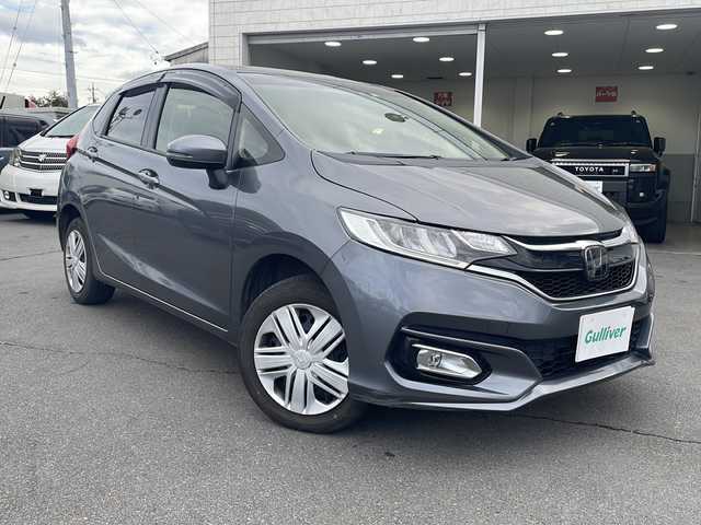 ホンダ フィット 13G･モデューロスタイル ホンダセンシング 長野県 2018(平30)年 16.6万km シルバー ・純正ディーラーオプションナビ/(Bluetooth/フルセグTV/)/・オートクルーズコントロール/・バックカメラ/・純正ビルトインETC/・アイドリングストップ/・AAC/・前後ドライブレコーダー/・プッシュスタートボタン/・4WD/・オートライト/・純正アルミホイール/・社外15インチアルミホイール付きスタッドレスタイヤ車載/・スマートキー/・取扱説明書/・保証書/・記録簿