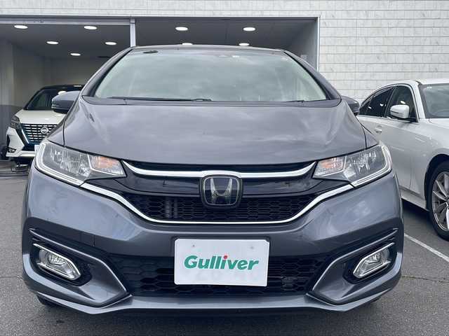 ホンダ フィット 13G･モデューロスタイル ホンダセンシング 長野県 2018(平30)年 16.6万km シルバー ・純正ディーラーオプションナビ/(Bluetooth/フルセグTV/)/・オートクルーズコントロール/・バックカメラ/・純正ビルトインETC/・アイドリングストップ/・AAC/・前後ドライブレコーダー/・プッシュスタートボタン/・4WD/・オートライト/・純正アルミホイール/・社外15インチアルミホイール付きスタッドレスタイヤ車載/・スマートキー/・取扱説明書/・保証書/・記録簿