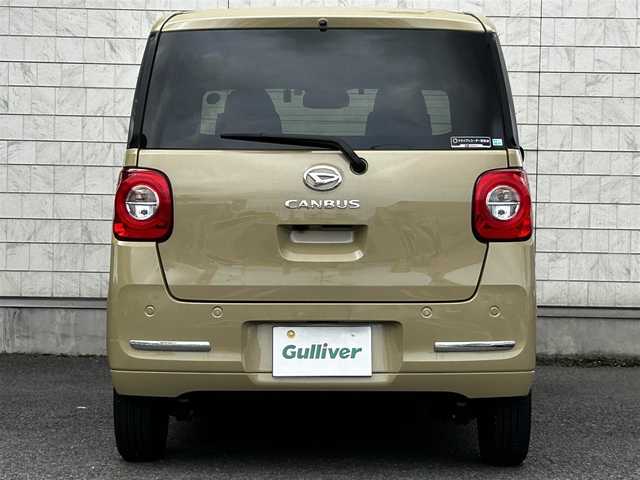 ダイハツ ムーヴ キャンバス セオリー G 大分県 2023(令5)年 0.6万km サンドベージュメタリック 純正SDナビ（NMZL-W73D）/Bluetooth/TV/CD/DVD/パワースライドドア（両側）/シートヒーター（D＋N席）/コーナーセンサー（前後）/オートブレーキホールド/アイドリングストップ/保温機能付きカップホルダー/電動格納ミラー/バックカメラ/USB・HDMI入力端子/ステアリングスイッチ/ベンチシート/スペアキー/純正フロアマット/革巻ステアリング/革巻シフトノブ/ドライブレコーダー/LED/ETC