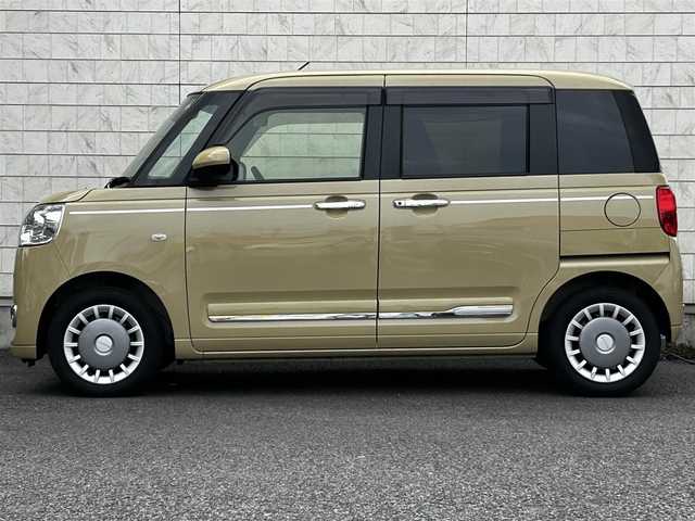 ダイハツ ムーヴ キャンバス セオリー G 大分県 2023(令5)年 0.6万km サンドベージュメタリック 純正SDナビ（NMZL-W73D）/Bluetooth/TV/CD/DVD/パワースライドドア（両側）/シートヒーター（D＋N席）/コーナーセンサー（前後）/オートブレーキホールド/アイドリングストップ/保温機能付きカップホルダー/電動格納ミラー/バックカメラ/USB・HDMI入力端子/ステアリングスイッチ/ベンチシート/スペアキー/純正フロアマット/革巻ステアリング/革巻シフトノブ/ドライブレコーダー/LED/ETC