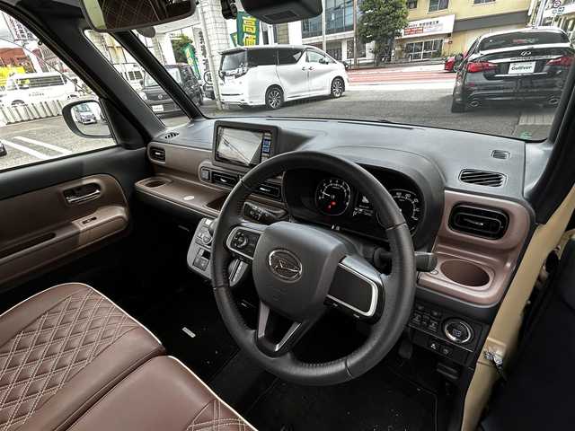 ダイハツ ムーヴ キャンバス セオリー G 大分県 2023(令5)年 0.6万km サンドベージュメタリック 純正SDナビ（NMZL-W73D）/Bluetooth/TV/CD/DVD/パワースライドドア（両側）/シートヒーター（D＋N席）/コーナーセンサー（前後）/オートブレーキホールド/アイドリングストップ/保温機能付きカップホルダー/電動格納ミラー/バックカメラ/USB・HDMI入力端子/ステアリングスイッチ/ベンチシート/スペアキー/純正フロアマット/革巻ステアリング/革巻シフトノブ/ドライブレコーダー/LED/ETC