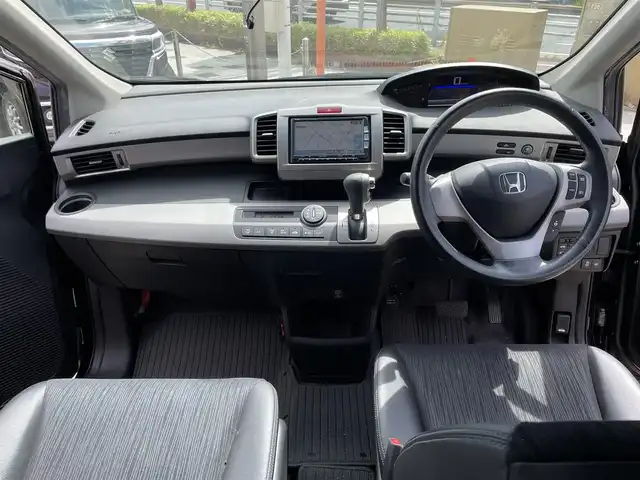ホンダ フリード スパイク ハイブリット ジャストセレクション 兵庫県 2012(平24)年 8.2万km プレミアムブラキッシュパール (株)IDOMが運営する【じしゃロン西宮店】の自社ローン専用車両になります。こちらは現金またはオートローンご利用時の価格です。自社ローンご希望の方は別途その旨お申付け下さい/＊ETC/＊バックカメラ/＊パワステ/＊パワーウィンドウ/＊クルーズコントロールあり/＊フルセグ/＊両側パワスラ/＊ハーフレザー/＊横滑り防止装置/＊オートライト