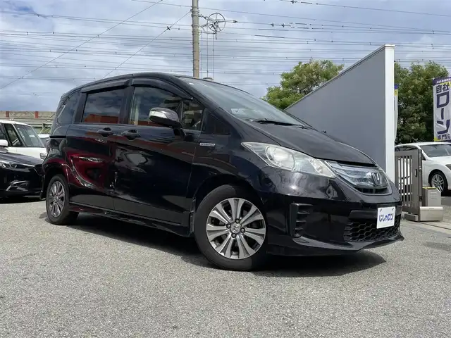 ホンダ フリード スパイク ハイブリット ジャストセレクション 兵庫県 2012(平24)年 8.2万km プレミアムブラキッシュパール (株)IDOMが運営する【じしゃロン西宮店】の自社ローン専用車両になります。こちらは現金またはオートローンご利用時の価格です。自社ローンご希望の方は別途その旨お申付け下さい/＊ETC/＊バックカメラ/＊パワステ/＊パワーウィンドウ/＊クルーズコントロールあり/＊フルセグ/＊両側パワスラ/＊ハーフレザー/＊横滑り防止装置/＊オートライト