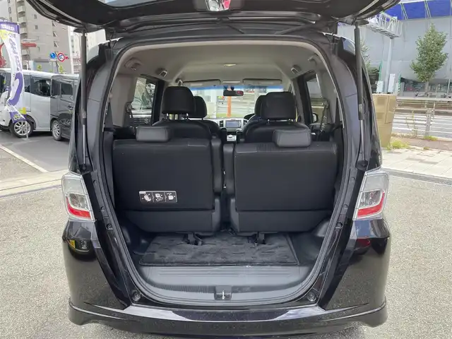 ホンダ フリード スパイク ハイブリット ジャストセレクション 兵庫県 2012(平24)年 8.2万km プレミアムブラキッシュパール (株)IDOMが運営する【じしゃロン西宮店】の自社ローン専用車両になります。こちらは現金またはオートローンご利用時の価格です。自社ローンご希望の方は別途その旨お申付け下さい/＊ETC/＊バックカメラ/＊パワステ/＊パワーウィンドウ/＊クルーズコントロールあり/＊フルセグ/＊両側パワスラ/＊ハーフレザー/＊横滑り防止装置/＊オートライト