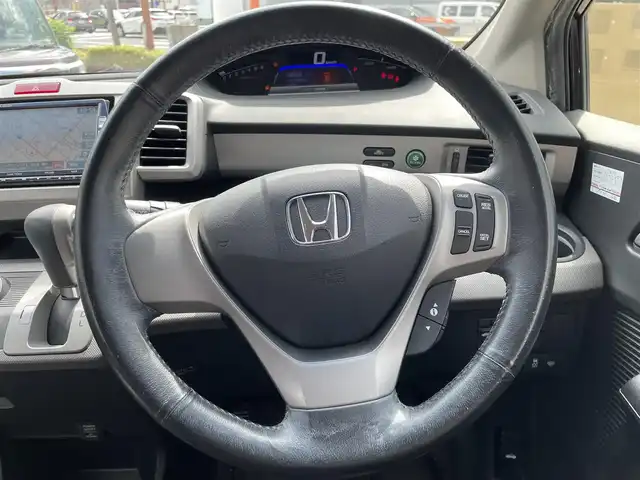 ホンダ フリード スパイク ハイブリット ジャストセレクション 兵庫県 2012(平24)年 8.2万km プレミアムブラキッシュパール (株)IDOMが運営する【じしゃロン西宮店】の自社ローン専用車両になります。こちらは現金またはオートローンご利用時の価格です。自社ローンご希望の方は別途その旨お申付け下さい/＊ETC/＊バックカメラ/＊パワステ/＊パワーウィンドウ/＊クルーズコントロールあり/＊フルセグ/＊両側パワスラ/＊ハーフレザー/＊横滑り防止装置/＊オートライト