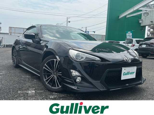 トヨタ ８６ GT リミテッド 岐阜県 2012(平24)年 12.7万km クリスタルブラックシリカ ワンオーナー/純正ナビ/AM/FM/Bluetooth/フルセグテレビ/DS/CD/DVD/ETC/ハーフレザーシート/VSCSPORT/トラクションコントロールシステム/電動格納ミラー/ドアバイザー/革ステアリング/TRDエアロ/マフラー