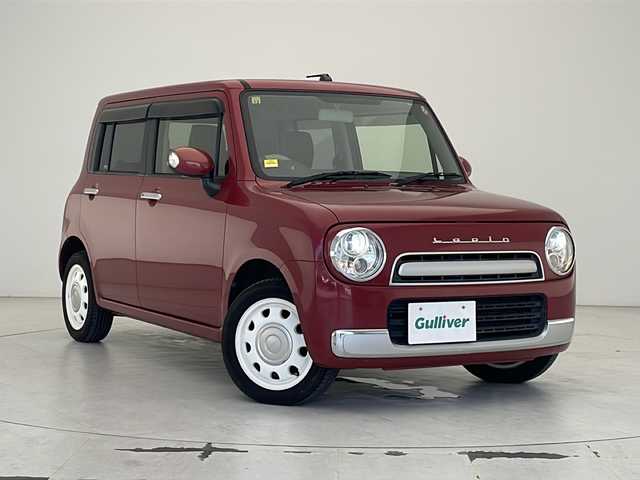スズキ ラパン ショコラ X 沖縄県 2014(平26)年 9.6万km フェニックスレッドパール 県外仕入れ車両																							社外メモリナビ(NR-MZ03)/（CD/DVD/SD/Bluetooth接続/フルセグTV）/アイドリングストップ/レザーシート/HIDヘッドライト/オートライト/純正フロアマット/電動格納ウィンカーミラー/プッシュスタート/スマートキー/取扱説明書