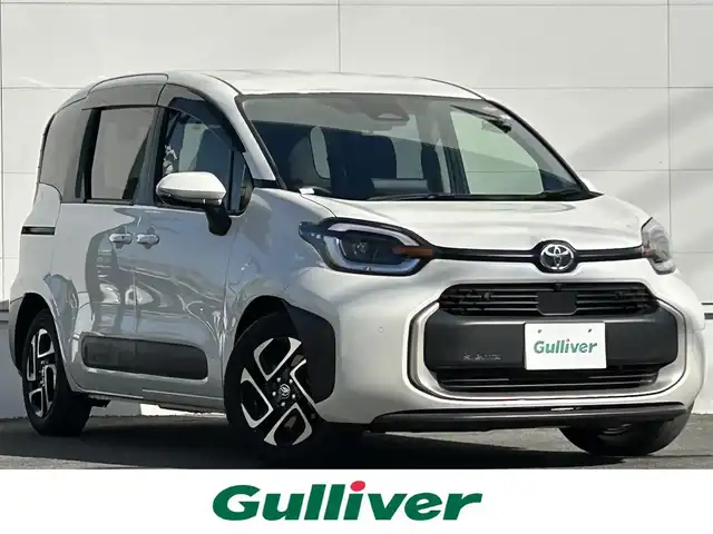 トヨタ シエンタ ハイブリッド Z 佐賀県 2023(令5)年 0.6万km ホワイトパールクリスタルシャイン 走行距離6027km/ワンオーナー(自社名済み)/トヨタセーフティセンス/・プリクラッシュセーフティ/・レーダークルーズコントロール/・アダプティブハイビーム/・レーントレーシングアシスト/・レーンディパーチャーアラート/ブラインドスポットモニター/パーキングサポートブレーキ/クリアランスソナー/純正ディスプレイオーディオ/・コネクティッドナビ/・アラウンドビューモニター/・フルセグTV/BT/ハンズフリーデュアルパワースライドドア/純正前後ドライブレコーダー/ETC2.0 /USB入力端子/フロアマット/スペアキー×1/保証書/取扱説明書