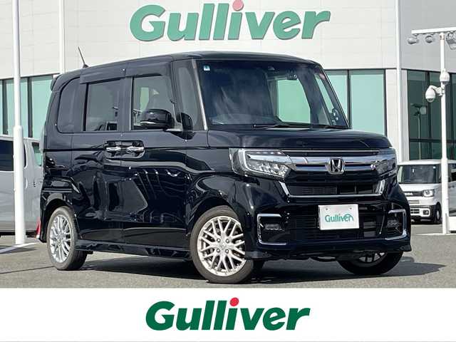 ホンダ Ｎ ＢＯＸ カスタム L ターボ 佐賀県 2022(令4)年 1.7万km クリスタルブラックパール 純正8インチメモリーナビゲーション/・フルセグTV/CD/DVD/SD/USB/Bluetooth/バックカメラ/前後ドライブレコーダー/ビルトインETC/両側パワースライドドア/電子パーキングブレーキ/BRAKE HOLD機能/ハーフレザーシート/DN席シートヒーター/ISOFIX対応/パドルシフト/革巻きステアリング/ステアリングリモコン/純正15インチアルミホイール/純正LEDヘッドライト/・オートマチックハイビーム/純正LEDフォグランプ/ドアバイザ―
