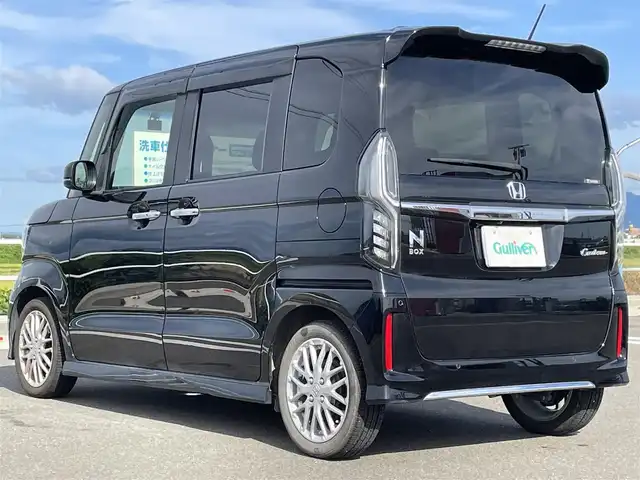 ホンダ Ｎ ＢＯＸ カスタム L ターボ 佐賀県 2022(令4)年 1.7万km クリスタルブラックパール 純正8インチメモリーナビゲーション/・フルセグTV/CD/DVD/SD/USB/Bluetooth/バックカメラ/前後ドライブレコーダー/ビルトインETC/両側パワースライドドア/電子パーキングブレーキ/BRAKE HOLD機能/ハーフレザーシート/DN席シートヒーター/ISOFIX対応/パドルシフト/革巻きステアリング/ステアリングリモコン/純正15インチアルミホイール/純正LEDヘッドライト/・オートマチックハイビーム/純正LEDフォグランプ/ドアバイザ―