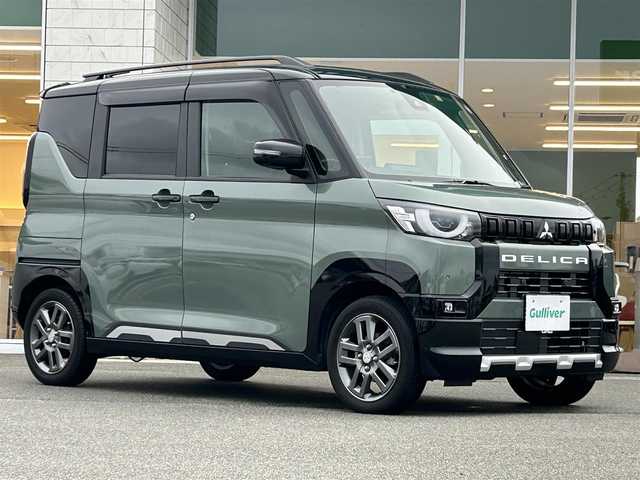 三菱 デリカミニ T プレミアム 兵庫県 2023(令5)年 2.3万km ＤグリーンⅡ ワンオーナー/社外9インチナビ/フルセグテレビ/BTオーディオ/CD/DVD再生機能/全方位カメラ/デジタルインナーミラー/ワイヤレス充電/前席シートヒーター/ステアリングヒーター/両側パワースライドドア/ETC2.0/パドルシフト/LEDヘッドライト/純正15インチAW