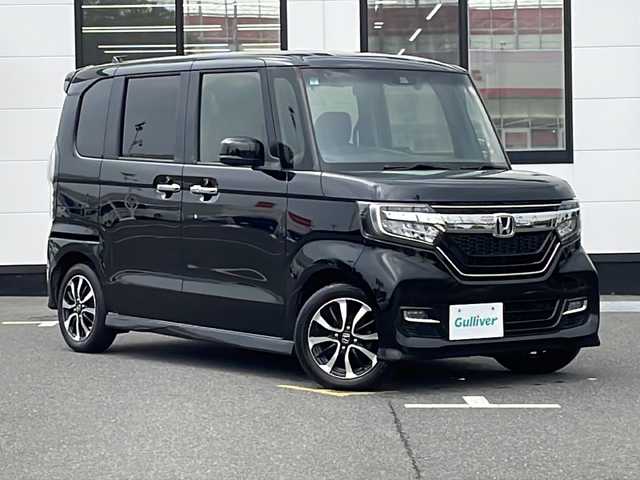 ホンダ Ｎ ＢＯＸ カスタム G L ホンダセンシング 山口県 2021(令3)年 3.6万km クリスタルブラックパール 純正7インチナビ（VXM-214VFi）/（Bluetooth/SD/CD/DVD/フルセグTV)/前後ドライブレコーダー/バックカメラ/シートヒーター（運転席/助手席）/ビルドインETC/片側パワースライドドア/Honda SENSING/・衝突軽減ブレーキ（CMBS）/・誤発進抑制機能/・歩行者事故低減ステアリング/・路外逸脱抑制機能/・渋滞追従機能付アダプティブクルーズコントロール（ACC）/・車線維持支援システム（LKAS）/・先行車発進お知らせ機能/・標識認識機能/・後方誤発進抑制機能/LEDヘッドライト/オートマチックハイビーム/オートライト/純正フロアマット/スペアキー1本/スマートキー/取扱説明書