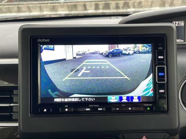 ホンダ Ｎ ＢＯＸ カスタム G L ホンダセンシング 山口県 2021(令3)年 3.6万km クリスタルブラックパール 純正7インチナビ（VXM-214VFi）/（Bluetooth/SD/CD/DVD/フルセグTV)/前後ドライブレコーダー/バックカメラ/シートヒーター（運転席/助手席）/ビルドインETC/片側パワースライドドア/Honda SENSING/・衝突軽減ブレーキ（CMBS）/・誤発進抑制機能/・歩行者事故低減ステアリング/・路外逸脱抑制機能/・渋滞追従機能付アダプティブクルーズコントロール（ACC）/・車線維持支援システム（LKAS）/・先行車発進お知らせ機能/・標識認識機能/・後方誤発進抑制機能/LEDヘッドライト/オートマチックハイビーム/オートライト/純正フロアマット/スペアキー1本/スマートキー/取扱説明書