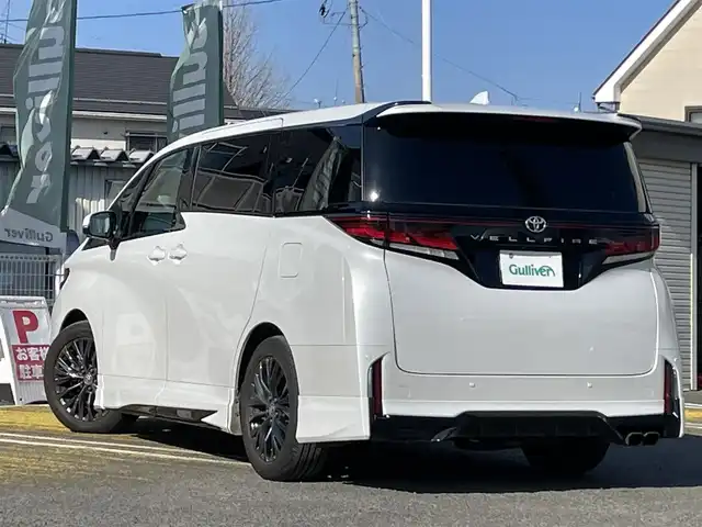 トヨタ ヴェルファイア Z プレミア 宮城県 2023(令5)年 1.7万km プラチナホワイトパールマイカ ワンオーナー/禁煙車/GRエアロ/デジタルインナーミラー/ユニバーサルステップ/純正14インチディスプレイオーディオ(ナビ機能あり)/BT/USB(AppleCarPlay/AndroidAuto)/フルセグTV/HDMI接続(MAXWIN DVD306)/トヨタセーフティセンス/プリクラッシュセーフティー/クリアランスソナー/ブラインドスポットモニター/レーダークルーズコントロール/パノラミックビューモニター/左右独立ムーンルーフ/両側パワースライドドア/パワーバックドア/ブラウン本革内装/シートヒーター/エアシート/パワーシート(D席メモリー機能付)/AC100V/置くだけ充電/3眼LEDヘッドランプ/フロント/リアフォグランプ/アダプティブハイビーム/スマートキー×2/ETC2.0/横滑り防止装置/盗難防止装置