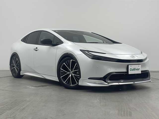 トヨタ プリウス Z 三重県 2023(令5)年 3.5万km プラチナホワイトパールマイカ 禁煙車/モデリスタエアロ/TEIN車高調/純正ディスプレイオーディオ/・Bluetooth・フルセグ・AM/FM・Miracast/トヨタセーフティセンス/・ＰＣＳ・ＬＤＡ・ＰＤＡ・ＰＫＳＢ・レーダークルーズコントロール　パノラミックビューモニター/デジタルインナーミラー/社外AWサマータイヤ積込/メモリー機能付パワーシート/シートヒーター/ベンチレーション/レザーシート/前後コーナーセンサー/ワイヤレス充電器/パワーバックドア/ステアリングヒーター/ステアリングヒーター/AC100V電源/ビルドインETC２．０