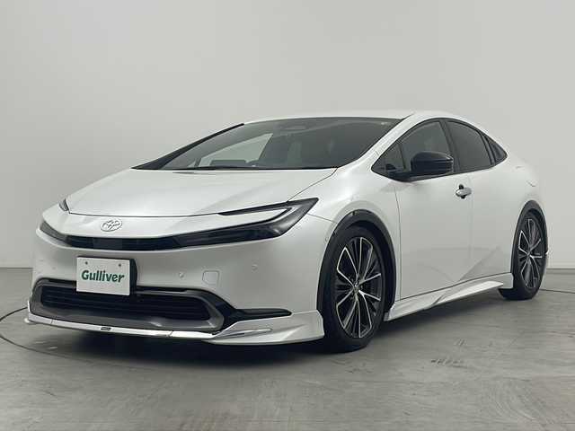 トヨタ プリウス Z 三重県 2023(令5)年 3.5万km プラチナホワイトパールマイカ 禁煙車/モデリスタエアロ/TEIN車高調/純正ディスプレイオーディオ/・Bluetooth・フルセグ・AM/FM・Miracast/トヨタセーフティセンス/・ＰＣＳ・ＬＤＡ・ＰＤＡ・ＰＫＳＢ・レーダークルーズコントロール　パノラミックビューモニター/デジタルインナーミラー/社外AWサマータイヤ積込/メモリー機能付パワーシート/シートヒーター/ベンチレーション/レザーシート/前後コーナーセンサー/ワイヤレス充電器/パワーバックドア/ステアリングヒーター/ステアリングヒーター/AC100V電源/ビルドインETC２．０