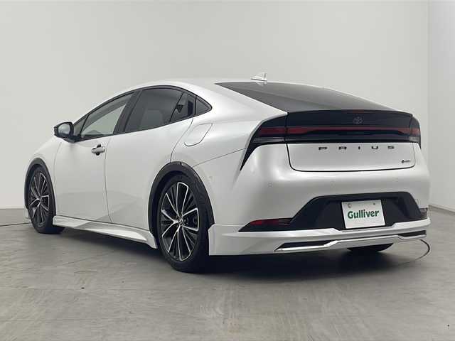 トヨタ プリウス Z 三重県 2023(令5)年 3.5万km プラチナホワイトパールマイカ 禁煙車/モデリスタエアロ/TEIN車高調/純正ディスプレイオーディオ/・Bluetooth・フルセグ・AM/FM・Miracast/トヨタセーフティセンス/・ＰＣＳ・ＬＤＡ・ＰＤＡ・ＰＫＳＢ・レーダークルーズコントロール　パノラミックビューモニター/デジタルインナーミラー/社外AWサマータイヤ積込/メモリー機能付パワーシート/シートヒーター/ベンチレーション/レザーシート/前後コーナーセンサー/ワイヤレス充電器/パワーバックドア/ステアリングヒーター/ステアリングヒーター/AC100V電源/ビルドインETC２．０