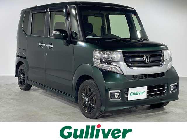 ホンダ Ｎ ＢＯＸ カスタム SSブラックSパッケージ 福岡県 2016(平28)年 4.5万km ブリティッシュグリーンP ・純正ナビ/・CD/DVD/・Bluetooth/・フルセグTV/・ラジオ/・IPoｄ/・Bカメラ/・ビルトインETC/・社外フロアマット/・スマートキー/・シートヒーター/・片側パワースライド/・オートライト/・ドアバイザー