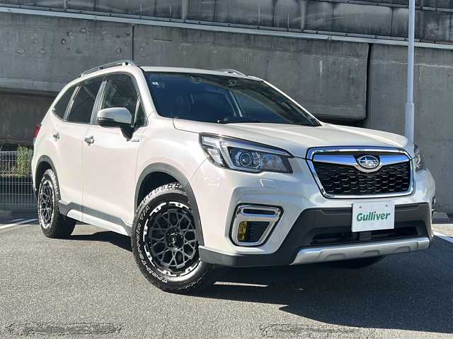 スバル フォレスター ハイブリッド アドバンス 愛知県 2020(令2)年 4万km クリスタルホワイトP 純正ナビ/フルセグTV・CD・DVD・Bluetooth・SD/バックカメラ/前席シートヒーター/後席シートヒーター/アイサイトVer3/・プリクラッシュセーフティ/・車線逸脱警報/・全車速追従クルーズコントロール/運転席メモリー機能付きパワーシート/助手席パワーシート/ルーフレール/クリアランスソナー/社外17インチアルミホイール/ドライバーモニタリングシステム/ステアリング連動ヘッドランプ/STiドアハンドルプロテクター/純正フロアマット/純正ドアバイザー/保証書/取扱説明書/スペアスマートキー/