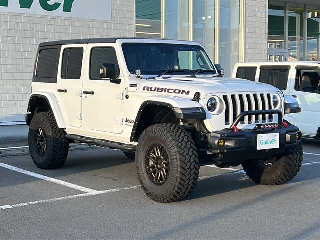 クライスラー・ジープ ジープ ラングラー アンリミテッド ルビコン 静岡県 2020(令2)年 0.6万km 白 /ワンオーナー//純正ナビ/地デジTV//社外CD//Bleutooth//FOX足回り2インチアップ//JAOSマフラー//PEDALCOMMNDER//USバンパー//レザーシート//シートヒーター//社外17インチAW//LEDヘッドライト//スマートキー//スペアキー//保証書//取説