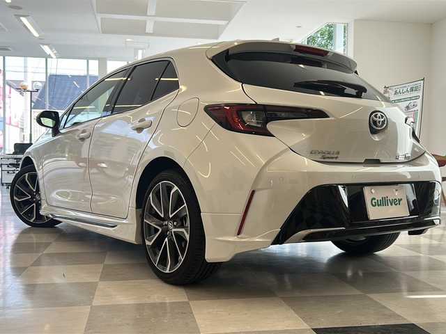 トヨタ カローラ スポーツ ハイブリッドG Z 岐阜県 2023(令5)年 0.9万km プラチナホワイトパールマイカ モデリスタエアロ/10.5型純正ナビゲーション/Bluetooth/フルセグ視聴（テレビキット/ETC2.0/プリクラッシュセーフティ/追従クルーズコントロール/ヘッドアップディスプレイ/ブラインドスポットモニター/ハーフレザーシート/前席シートヒーター/LEDヘッドライト/オートハイビーム/プッシュスタート/スマートキー/スペアキー/取扱説明書・記録簿