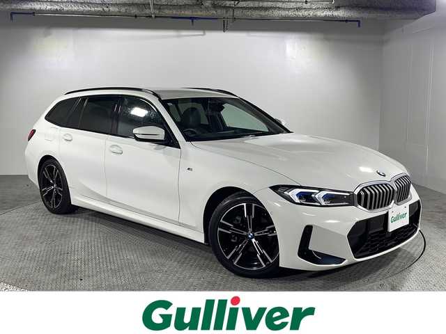 ＢＭＷ ＢＭＷ ３１８ｉ ツーリング Mスポーツ 沖縄県 2023(令5)年 0.7万km アルピンホワイトⅢ 禁煙車/ワンオーナー/純正ナビ/全方位カメラ/AppleCarPlay/BluetoothAudio/置くだけ充電/衝突被害軽減システム/アクティブクルーズコントロール/ビルドインETC/ハーフレザーシート/パワーシート/シートヒーター/コーナーセンサー/ヘッドアップディスプレイ/ブラインドスポットモニター/パドルシフト/オートライト/保証書/取扱説明書/純正18インチアルミホイール/純正フロアマット/スペアキー