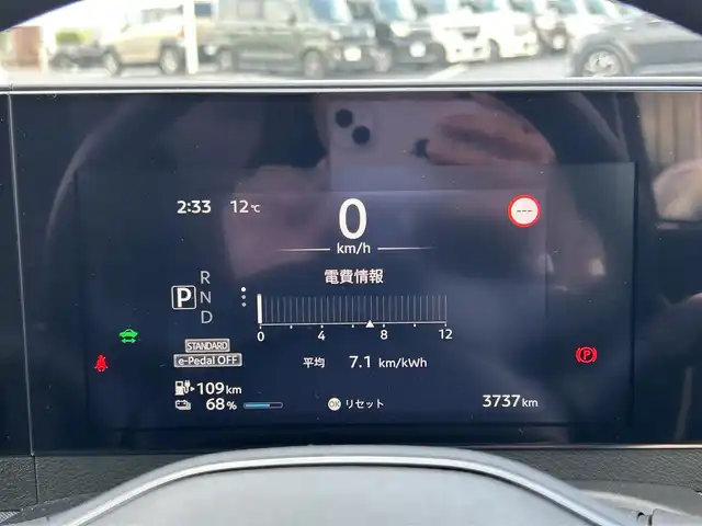 日産 サクラ G 島根県 2023(令5)年 0.4万km ホワイトパール 登録時走行距離3737km/ワンオーナー/純正ナビ(Bluetooth・AM・FM)/フルセグTV/全周囲カメラ/プロパイロット/レーダークルーズコントロール/前後コーナーセンサー/ETC2.0/シートヒーター(運転席・助手席)/ハンドルヒーター/オートライト/LEDヘッドライト/フォグランプ/純正14インチAW/純正フロアマット/スマートキー(スペアキー×1)/禁煙車