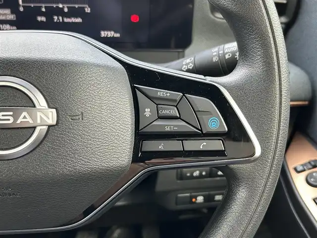 日産 サクラ G 島根県 2023(令5)年 0.4万km ホワイトパール 登録時走行距離3737km/ワンオーナー/純正ナビ(Bluetooth・AM・FM)/フルセグTV/全周囲カメラ/プロパイロット/レーダークルーズコントロール/前後コーナーセンサー/ETC2.0/シートヒーター(運転席・助手席)/ハンドルヒーター/オートライト/LEDヘッドライト/フォグランプ/純正14インチAW/純正フロアマット/スマートキー(スペアキー×1)/禁煙車