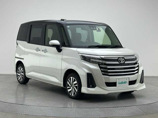 トヨタ ルーミー カスタムG 兵庫県 2023(令5)年 4.8万km ブラックマイカメタリック/パールホワイト2トーン 社外メモリナビ(CD/Bt/ワンセグ)/・MDV-D309BT/バックカメラ/両側パワースライドドア/ACC/PCS/コーナーセンサー/電子パーキング/オートホールド/LEDヘッドライト/LEDフォグ/オートハイビーム/ドライブレコーダー/ETC/アイドリングストップ/オプションスペアタイヤ/純正14AW/純正マット