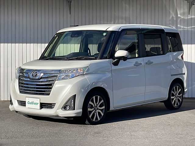 トヨタ ルーミー カスタムG－T 静岡県 2019(令1)年 2.2万km パールホワイトⅢ ９インチＳＤナビ（NSZT-Y68T）/CD/DVD/SD/Bluetooth/フルセグ/バックモニター/純正ビルトインETC/前方ドライブレコーダー/追従型クルーズコントロ―ル/レーンキープアシスト/前後コーナーセンサー/盗難防止装置/前席シートヒーター/両側パワースライドドア/純正LEDヘッドライト/フォグランプ/オートマチックハイビーム/衝突被害軽減システム/横滑り防止機能/純正15インチAW/純正ドアバイザー/純正フロアマット/取扱説明書/保証書