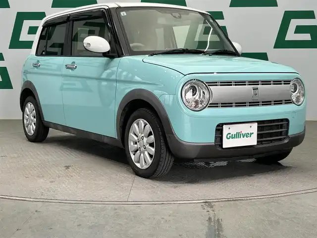 スズキ ラパン X 鹿児島県 2017(平29)年 3.8万km フレンチミントパールメタリック 社外7インチナビ(CN-RA03D)/バックカメラ/フルセグTV/ビルトインETC/アイドリングストップ/運転席シートヒーター/レーダーブレーキサポート/純正フロアマット/純正14インチアルミホイール/ドアバイザー/オートライト/キセノンヘッドライト/プッシュスタート/スマートキー/横滑り防止装置/盗難防止装置
