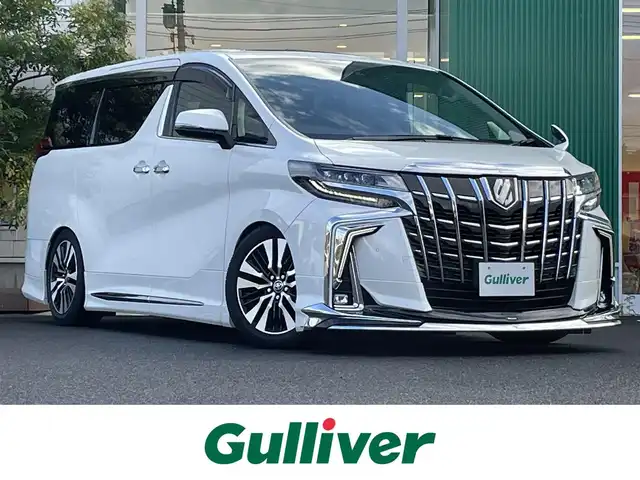 トヨタ アルファード S Cパッケージ 岡山県 2020(令2)年 6.3万km ホワイトパールクリスタルシャイン 純正9インチディスプレイオーディオ/フルセグTV、CD、DVD、Bluetooth、AM、FM/純正12インチフリップダウンモニター/デジタルインナーミラー/両側パワースライドドア/ツインムーンルーフ/モデリスタエアロ/ステアリングヒーター/前席シートヒーター/前席エアシート/メモリーシート/クリアランスソナー/レーダークルーズコントロール/レーンキープアシスト/パワーバックドア