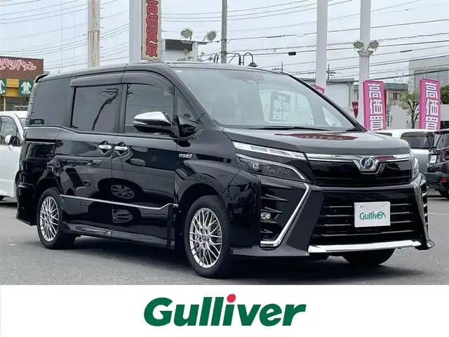 トヨタ ヴォクシー ハイブリッド ZS 煌Ⅱ 群馬県 2020(令2)年 8.6万km ブラック 3列シート/ワンオーナー/メモリナビ/フルセグテレビ/バックカメラ/クルーズコントロール/プッシュスタート/両側パワースライドドア/ビルドインETC/コーナーセンサー/オートマチックハイビーム/フルフラットシート/スペアキー1本/取扱説明書/保証書/記録簿