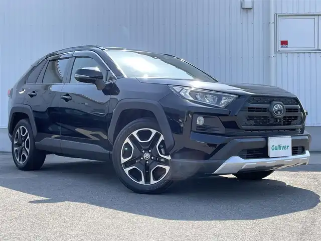 トヨタ ＲＡＶ４ アドベンチャー 愛媛県 2021(令3)年 3.3万km アティチュードブラックマイカ 純正ディスプレイオーディオ/BT/フルセグTV　/全周囲カメラ　/前後ドラレコ　/レーダークルーズコントロール　/電動リアゲート　/サンルーフ　/デジタルインナーミラー　/BSM　/Ｄ席パワーシート/D/N席シートエアコン　/D/N席シートヒーター/ETC/電動パーキングブレーキ/ステアリングヒーター/ダウンヒルアシストコントロール/電格ミラー/ルーフレール/ラゲッジマット/現状サマー(純正AＷ)(235/55/R19)