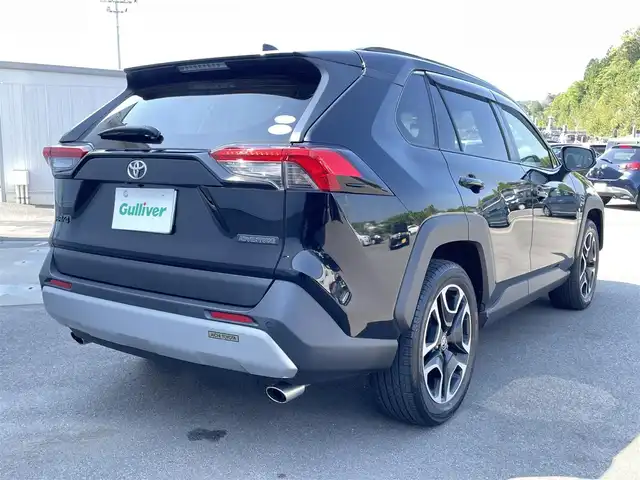トヨタ ＲＡＶ４ アドベンチャー 愛媛県 2021(令3)年 3.3万km アティチュードブラックマイカ サンルーフ　/純正ディスプレイオーディオ/BT/フルセグTV　/全周囲カメラ　/前後ドラレコ　/セーフティセンス（衝突回避支援パッケージ）/・プリクラッシュセーフティ/・レーントレーシングアシストサポート/・レーダークルーズコントロール/・オートマチックハイビーム/・ロードサインアシスト/電動リアゲート　/デジタルインナーミラー　/BSM　/Ｄ席パワーシート/D/N席シートエアコン　/D/N席シートヒーター/ETC/電動パーキングブレーキ/ステアリングヒーター/ダウンヒルアシストコントロール/電格ミラー/ルーフレール/ラゲッジマット/現状サマー(純正AＷ)(235/55/R19)/禁煙車