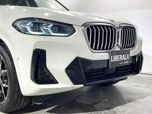 ＢＭＷ Ｘ３ xDrive20d Mスポーツ 道央・札幌 2022(令4)年 4.1万km アルピンホワイトⅢ 電動パノラマ・ガラス・サンルーフ/ドライビング・アシスト・プロフェッショナル/・高速道路渋滞ハンズ・オフ・アシスト/・トラフィック・サイン・アシスト（速度制限認識）/・ACC/・ステアリング＆レーン・コントロール・アシスト/・レーン・ディパーチャー・ウォーニング/（車線逸脱警告システム）/・レーン・チェンジ・アシスト/・レーン・キーピング・アシスト/・クロス・トラフィック・ウォーニング/・クロスロード・ウォーニング/・前車接近警告機能/・後車衝突警告機能/・衝突回避・被害軽減ブレーキ/・エマージェンシー・ストップ・アシスト/パーキングアシストプラス/・PDC/・パーキングアシスト/・トップビュー＋３Dビュー/・サイドビューカメラ/・リアビューカメラ（予想進路表示機能付）/アダプティブLEDヘッドライト/電動フロントシート/運転席メモリー機能付/フロントシートヒーティング/リアシートヒーティング/BMWライブコックピット/・１２・３インチマルチディスプレイ・メーターパネル/・１２・３インチワイド・コントロール・ディスプレイ/・HDDナビ/オートマチックテールゲート/レインセンサー