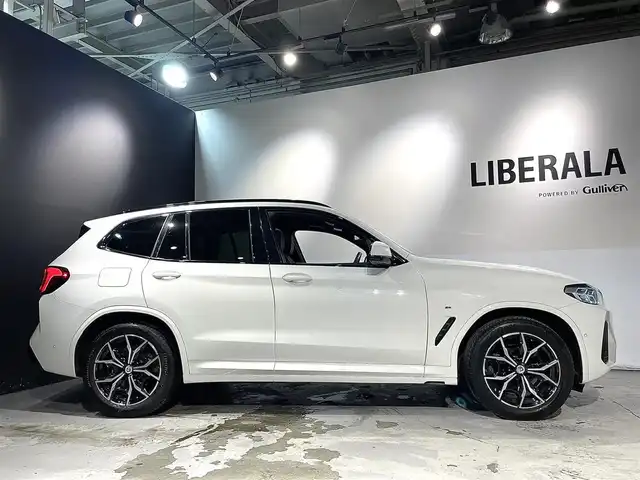 ＢＭＷ Ｘ３ xDrive20d Mスポーツ 道央・札幌 2022(令4)年 4.1万km アルピンホワイトⅢ 電動パノラマ・ガラス・サンルーフ/ドライビング・アシスト・プロフェッショナル/・高速道路渋滞ハンズ・オフ・アシスト/・トラフィック・サイン・アシスト（速度制限認識）/・ACC/・ステアリング＆レーン・コントロール・アシスト/・レーン・ディパーチャー・ウォーニング/（車線逸脱警告システム）/・レーン・チェンジ・アシスト/・レーン・キーピング・アシスト/・クロス・トラフィック・ウォーニング/・クロスロード・ウォーニング/・前車接近警告機能/・後車衝突警告機能/・衝突回避・被害軽減ブレーキ/・エマージェンシー・ストップ・アシスト/パーキングアシストプラス/・PDC/・パーキングアシスト/・トップビュー＋３Dビュー/・サイドビューカメラ/・リアビューカメラ（予想進路表示機能付）/アダプティブLEDヘッドライト/電動フロントシート/運転席メモリー機能付/フロントシートヒーティング/リアシートヒーティング/BMWライブコックピット/・１２・３インチマルチディスプレイ・メーターパネル/・１２・３インチワイド・コントロール・ディスプレイ/・HDDナビ/オートマチックテールゲート/レインセンサー