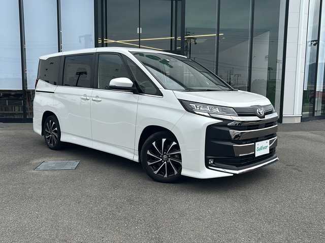 トヨタ ノア S－Z 愛媛県 2022(令4)年 5.9万km ホワイトパールクリスタルシャイン 純正ナビ/Bluetooth/フルセグTV/HDMI/DVD/バックカメラ/ETC2.0/フリップダウンモニター/前後ドラレコ/両側パワースライドドア/シートヒーター/クルコン/LEDヘッドライト/オートライト/オートマチックハイビーム/純正17インチアルミホイール/純正フロアマット/プリクラッシュ/コーナーセンサー/ＭＴモード付き
