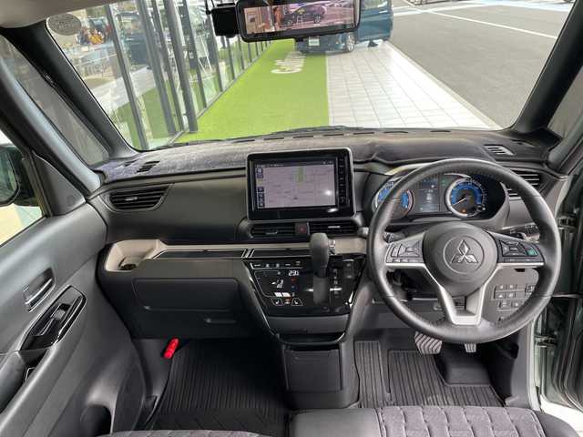 三菱 デリカミニ T プレミアム 愛知県 2024(令6)年 0.5万km ＤグリーンＭ マイパイロット/フロントバンパーガード/純正9型ナビ/全方位カメラ/両側パワースライドドア/クルーズコントロール/シートヒーター/ハンズフリースライドドア/バックカメラ/コーナーセンサー/アルミホイール/ルーフレール/LEDヘッドライト/パドルシフト/インテリジェントミラー/ステアリングヒーター/オートマチックハイビーム/ドライブレコーダー/ETC/衝突軽減システム/フルセグ/CD DVD/Bluetooth/ステアリングスイッチ/スマートキー/プッシュスタート