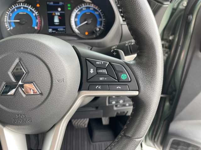 三菱 デリカミニ T プレミアム 愛知県 2024(令6)年 0.5万km ＤグリーンＭ マイパイロット/フロントバンパーガード/純正9型ナビ/全方位カメラ/両側パワースライドドア/クルーズコントロール/シートヒーター/ハンズフリースライドドア/バックカメラ/コーナーセンサー/アルミホイール/ルーフレール/LEDヘッドライト/パドルシフト/インテリジェントミラー/ステアリングヒーター/オートマチックハイビーム/ドライブレコーダー/ETC/衝突軽減システム/フルセグ/CD DVD/Bluetooth/ステアリングスイッチ/スマートキー/プッシュスタート