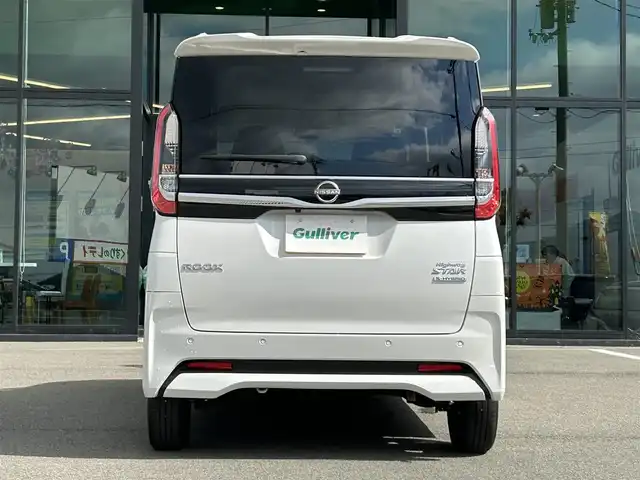 日産 ルークス ハイウェイスター X 愛媛県 2024(令6)年 1.4万km ホワイトパール 純正９型ナビ/全周囲カメラ/左側電動スライドドア/左側ハンズフリースライド/インテリジェントルームミラー/セーフティシールド/クリアランスソナー/リアサーキュレーター/後席サンシェイド/アイドリングストップ/ETC/純正フロアマット/ステアリングリモコン/電格ミラー/ヘッドライトレベライザー/LEDヘッドライト/フォグランプ/禁煙