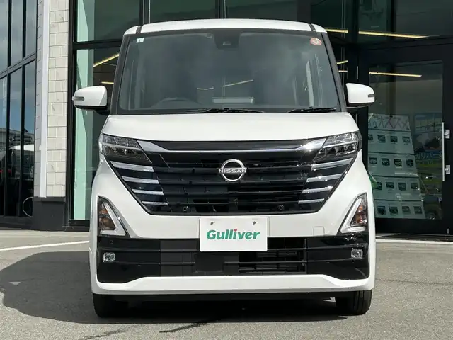 日産 ルークス ハイウェイスター X 愛媛県 2024(令6)年 1.4万km ホワイトパール 純正９型ナビ/全周囲カメラ/左側電動スライドドア/左側ハンズフリースライド/インテリジェントルームミラー/セーフティシールド/クリアランスソナー/リアサーキュレーター/後席サンシェイド/アイドリングストップ/ETC/純正フロアマット/ステアリングリモコン/電格ミラー/ヘッドライトレベライザー/LEDヘッドライト/フォグランプ/禁煙