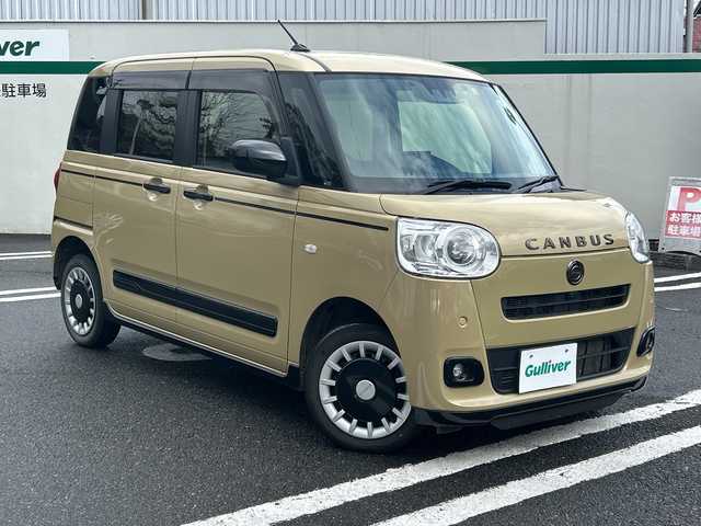 ダイハツ ムーヴ キャンバス セオリー G ターボ 東京都 2022(令4)年 6.2万km サンドベージュメタリック 4WD/ワンオーナー/メモリナビ/フルセグテレビ/バックカメラ/両側パワースライドドア/プッシュスタート/ETC/スマートアシスト/保証書/取説書