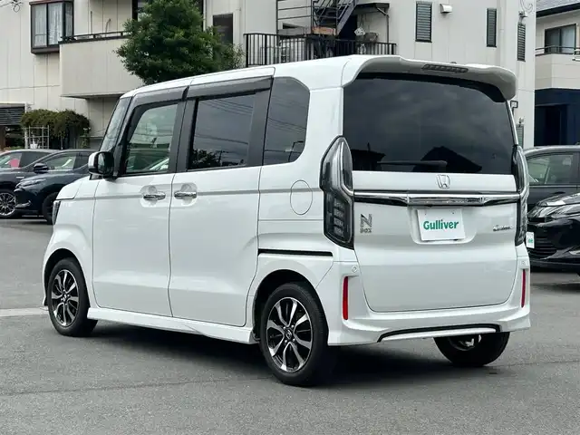 ホンダ Ｎ ＢＯＸ カスタム G EX ホンダセンシング 静岡県 2019(平31)年 2.6万km プラチナホワイトパール エンジンスタートボタン/パワーステアリング/パワーウィンドウ/アイドリングストップ/オートエアコン/スマートキー/クルーズコントロール/純正ETC/バックカメラ/SDナビ(CD.DVD.BT.フルセグ)/ウォークスルー/純正フロアマット/両側パワースライドドア/純正アルミホイール/ABS/横滑り防止装置/コーナーセンサー/レーンキープアシスト/オートライト/LEDライト/W+サイドエアバック/衝突軽減システム/カーテンエアバック