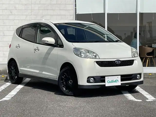 ダイハツ ソニカ RS Limited 宮崎県 2006(平18)年 13.8万km ホワイトパールマイカ 純正HDDナビ【NHDT-W57】/・AM・FM・DVD・CD/モモステアリング/ステアリングスイッチ/MINXマフラー【車検対応】/ENKEI製15インチホイール/電動格納ミラー/純正フロアマット/純正ドアバイザー/純正HIDヘッドライト/スマートキー