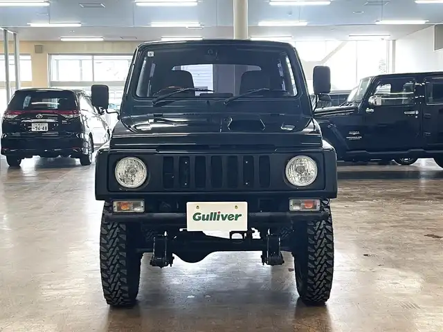 スズキ ジムニー ワイルドウィンド LTD 道央・札幌 1993(平5)年 18.3万km ダーククラシックジェイドパール 5MT/リフトアップ/マッドタイヤ/　GEOLANDAR　M/T　G003/　2025年製　9mm/前後パイプバンパー/社外マフラー（車検対応）/社外ヘッドライトレンズ/社外ウインカーレンズ（前/横）/社外フロントグリル/社外ステアリング/社外シートカバー/ナンバー移動キット/社外オーディオ/　CD/AUX/USB/FM/AM